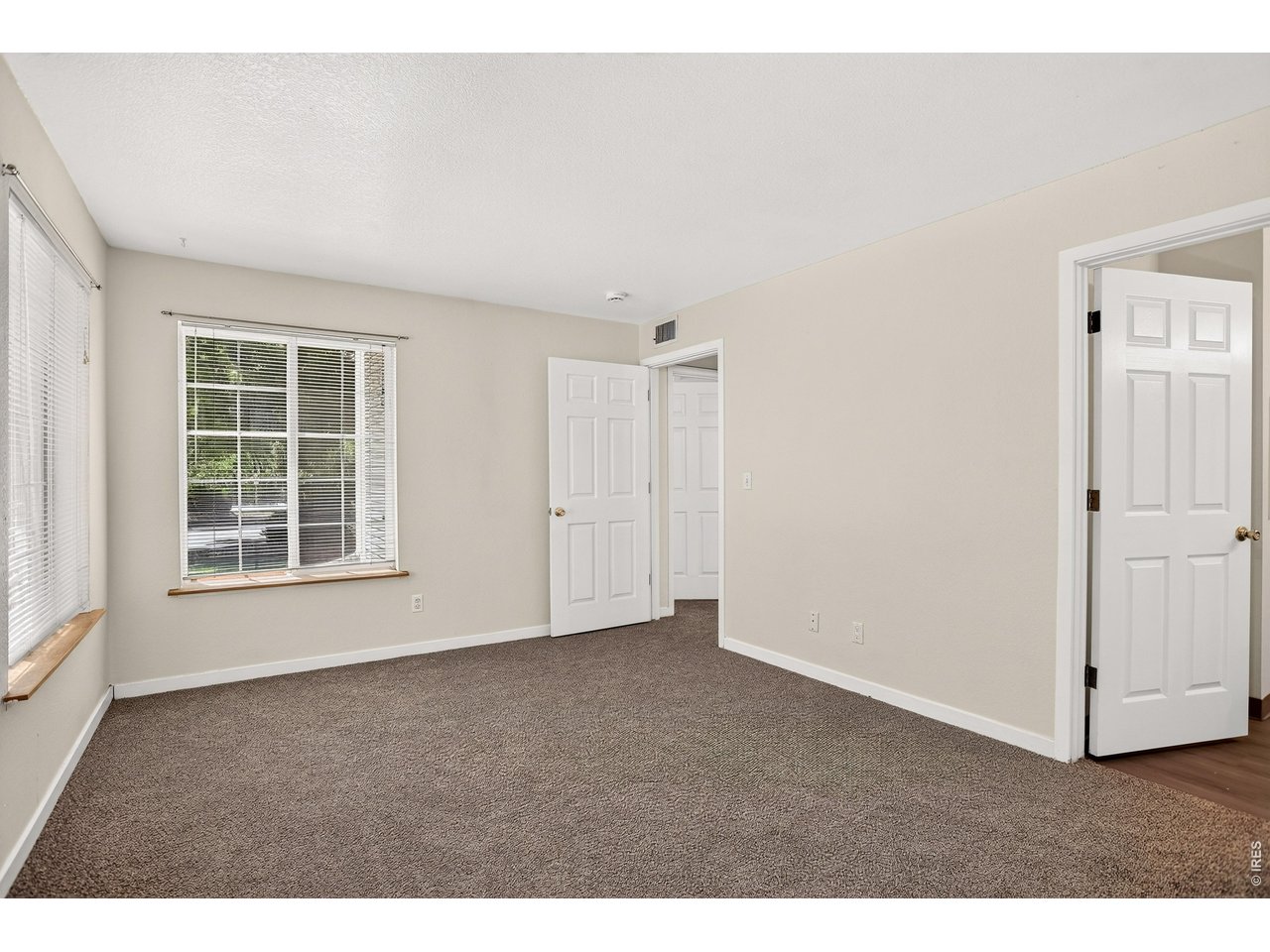 1225 West Prospect Road, Unit 40 Fort Collins, CO 80526 - Photo 24 of 29 Primary Bedroom