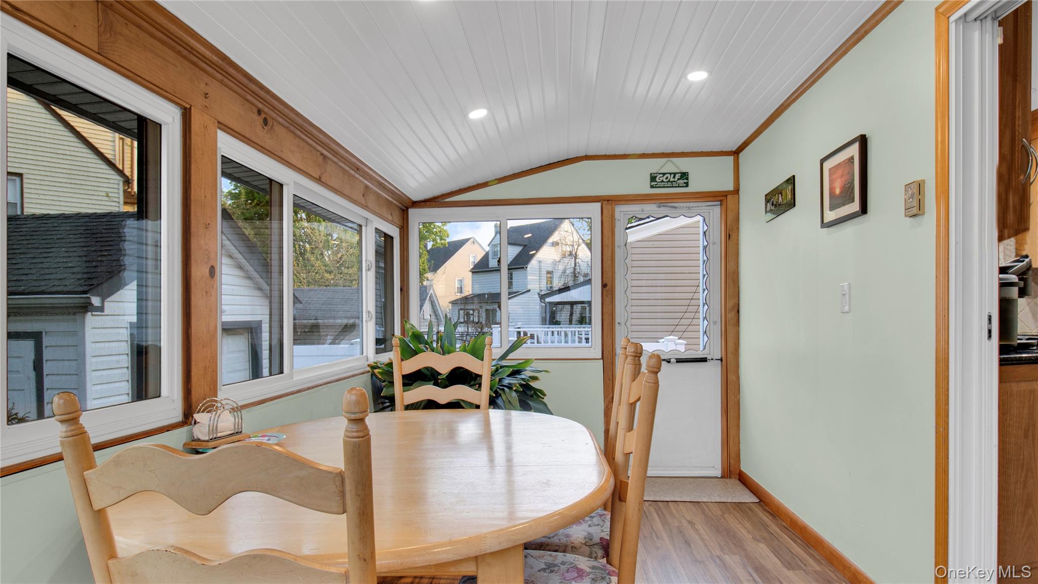 56 Liggett Road Valley Stream, NY 11581 - Photo 18 of 29 a view of a dining room with furniture window and wooden floor