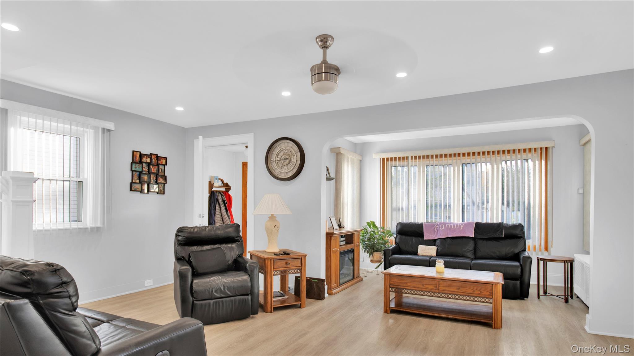 56 Liggett Road Valley Stream, NY 11581 - Photo 6 of 29 a living room with furniture and a window