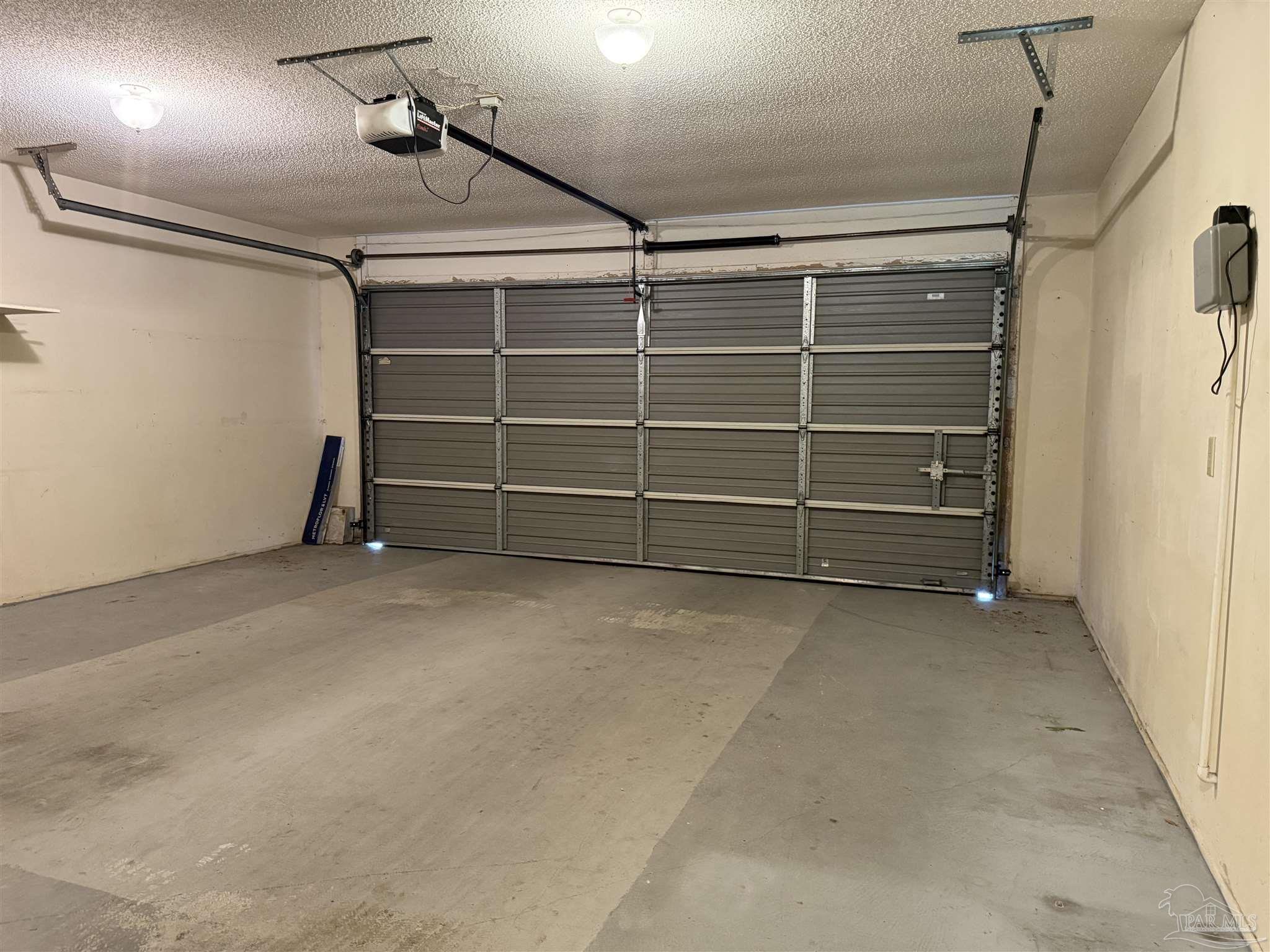 4814 Autumn Drive Pace, FL 32571 - Photo 19 of 52 a view of an empty room with a staircase
