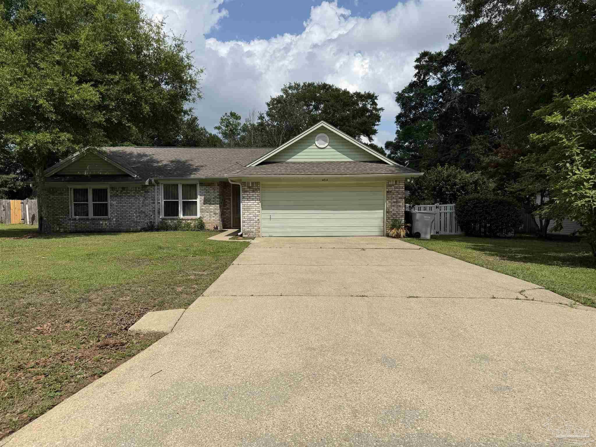 4814 Autumn Drive Pace, FL 32571 - Photo 2 of 52 front view of a house with a yard