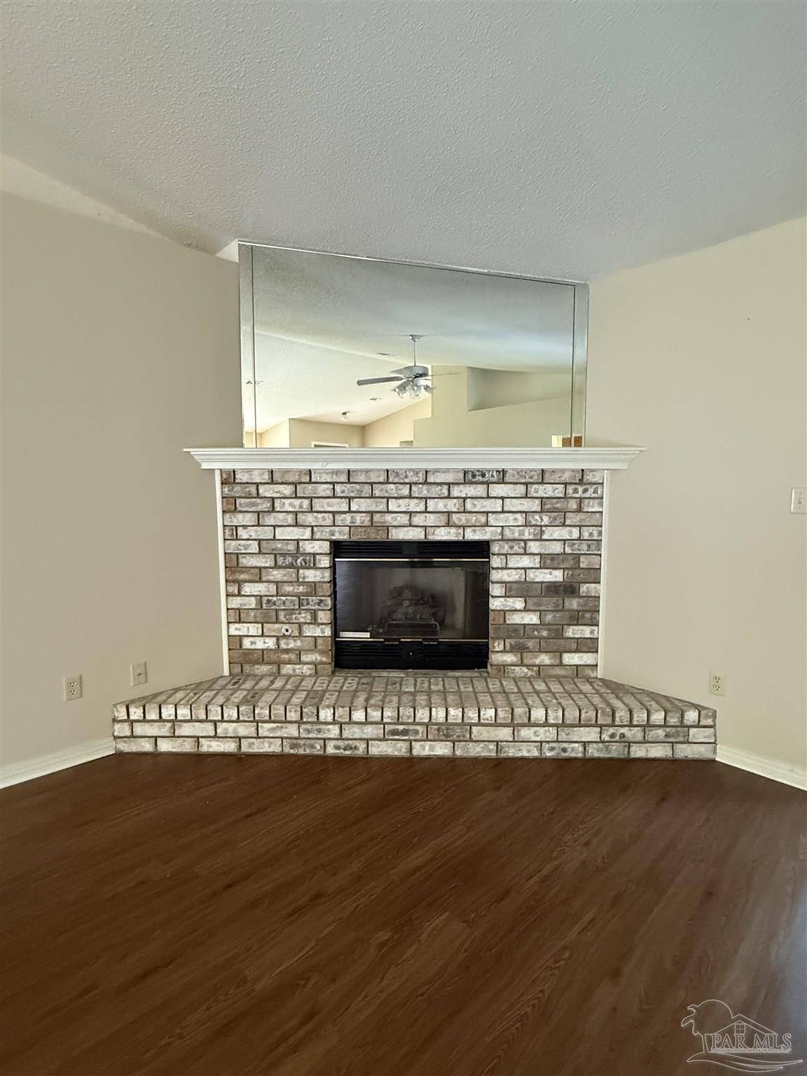 4814 Autumn Drive Pace, FL 32571 - Photo 43 of 52 a living room with a fireplace