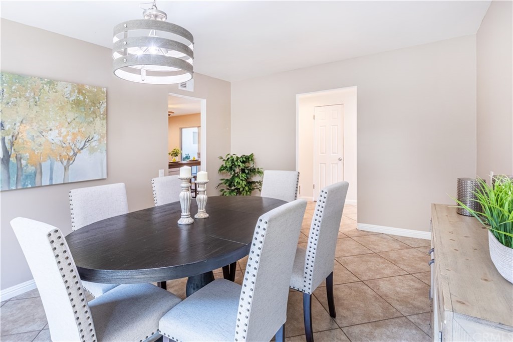 1408 Las Lomas Drive Brea, CA 92821 - Photo 13 of 47 a dining room with furniture a chandelier and window
