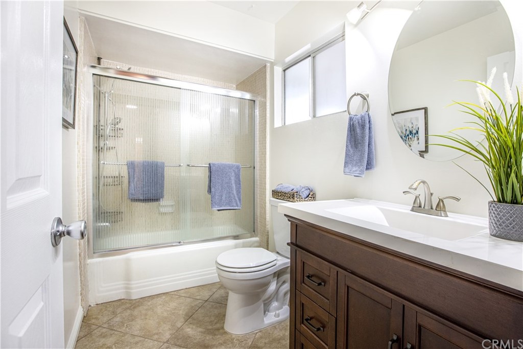 1408 Las Lomas Drive Brea, CA 92821 - Photo 33 of 47 a bathroom with a sink a toilet and shower