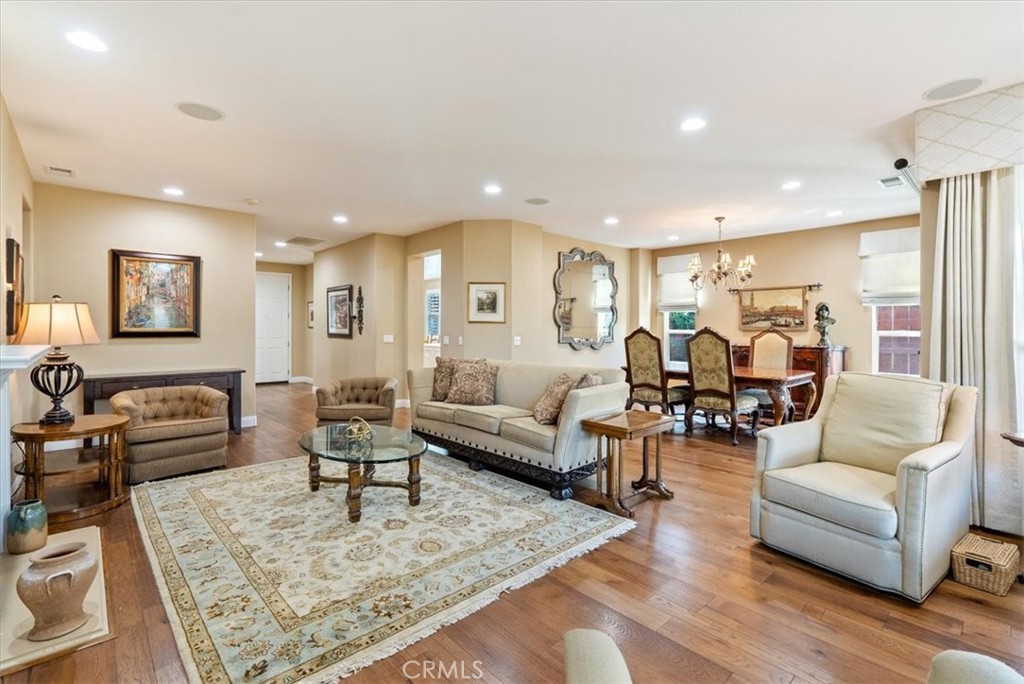 2425 Traditions Loop Paso Robles, CA 93446 - Photo 13 of 34 a living room with furniture and wooden floor