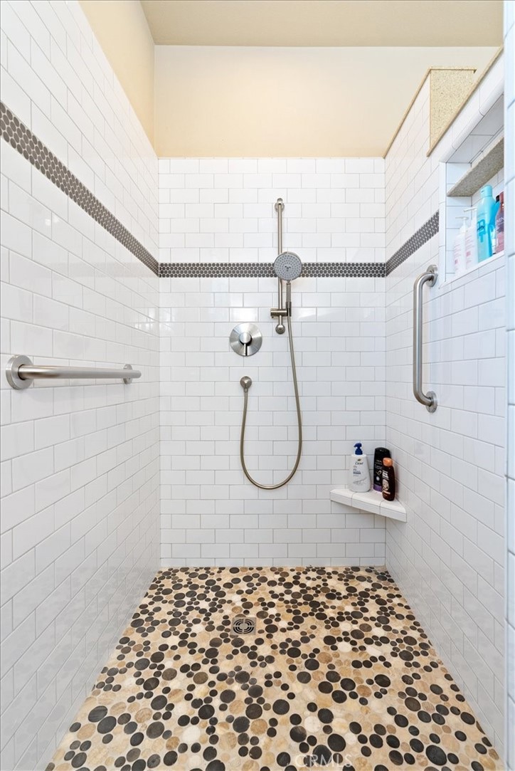 2425 Traditions Loop Paso Robles, CA 93446 - Photo 20 of 34 a bathroom with a shower