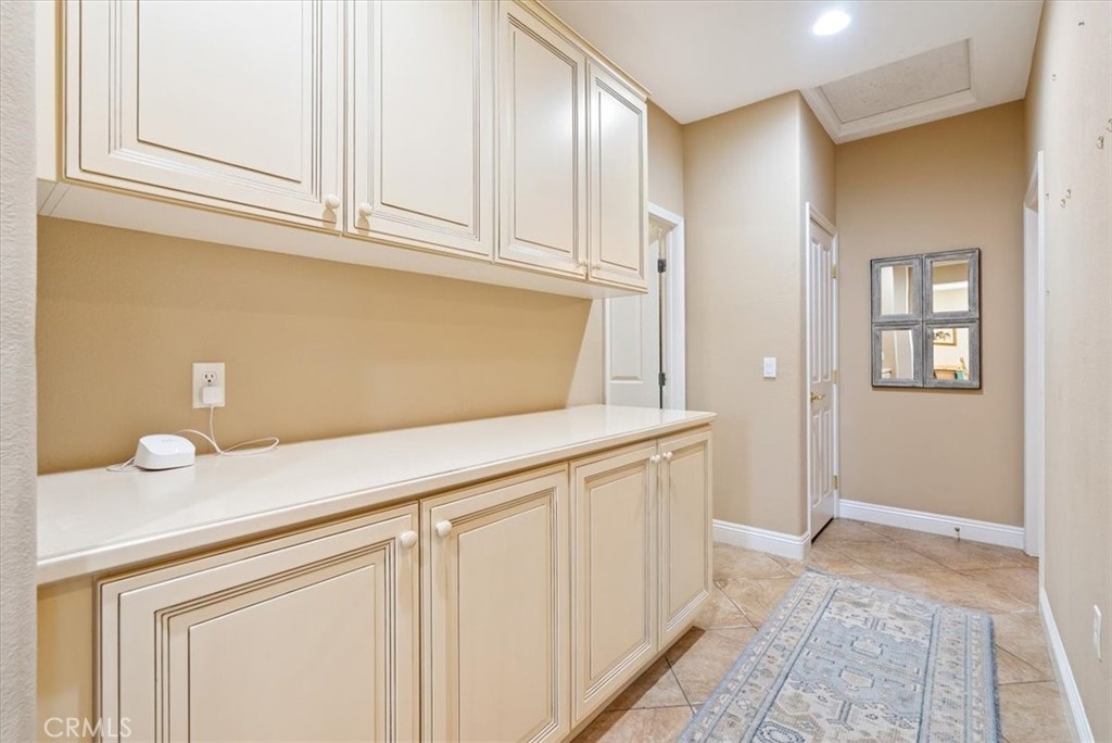 2425 Traditions Loop Paso Robles, CA 93446 - Photo 23 of 34 a view of cabinets with wooden floor