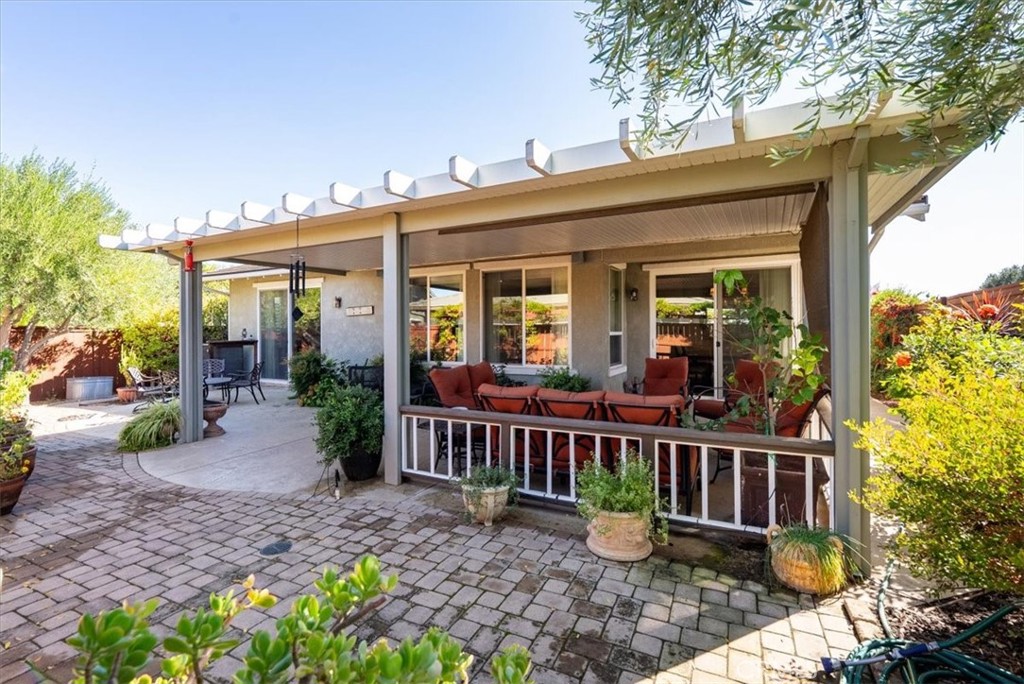2425 Traditions Loop Paso Robles, CA 93446 - Photo 29 of 34 a view of a house with porch and garden