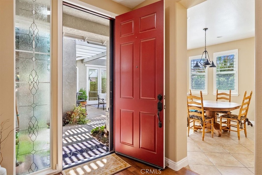 2425 Traditions Loop Paso Robles, CA 93446 - Photo 5 of 34 a view of a porch with a table and chairs