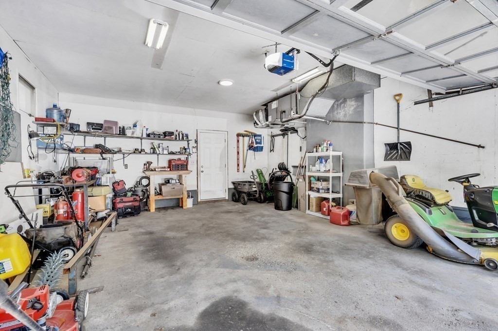 91 Lower Gore Road Webster, MA 01570 - Photo 27 of 37 a view of a storage room with a lot of stuff