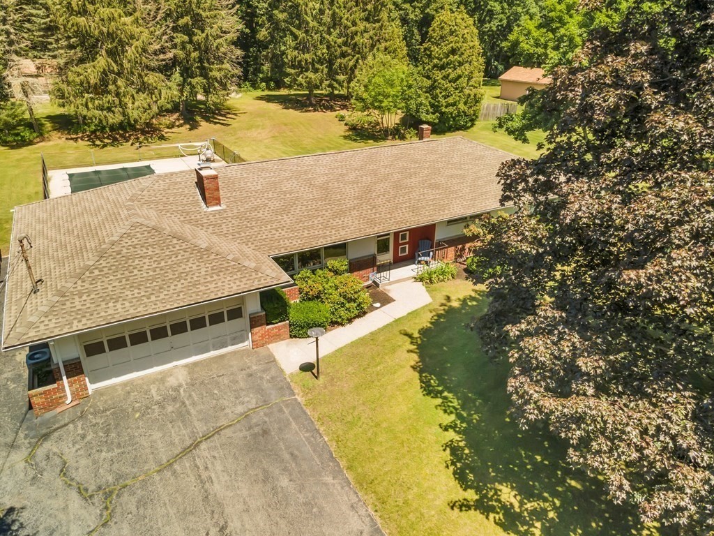 91 Lower Gore Road Webster, MA 01570 - Photo 3 of 37 a view of a swimming pool with a yard