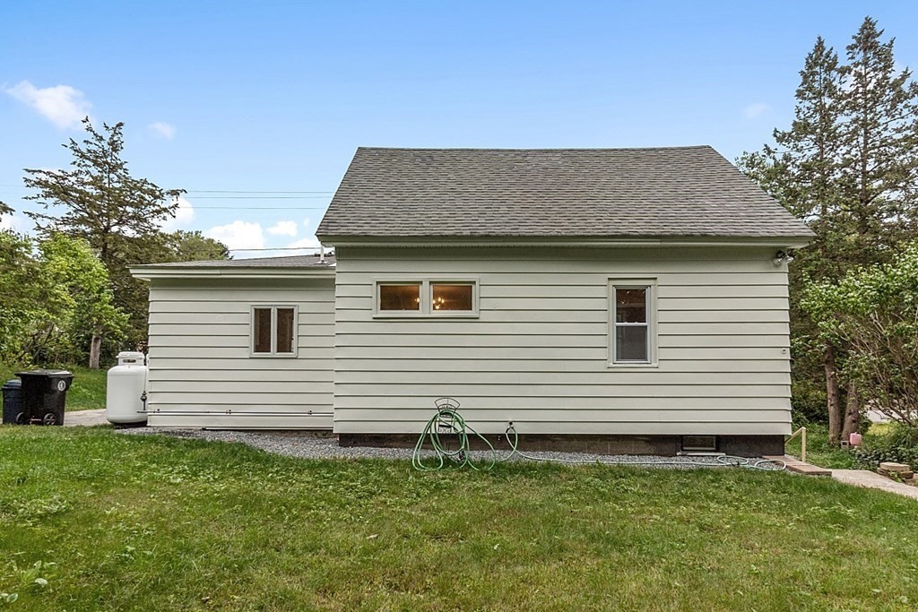 6 Catacunemaug Road Shirley, MA 01464 - Photo 31 of 32 a view of a house with a backyard