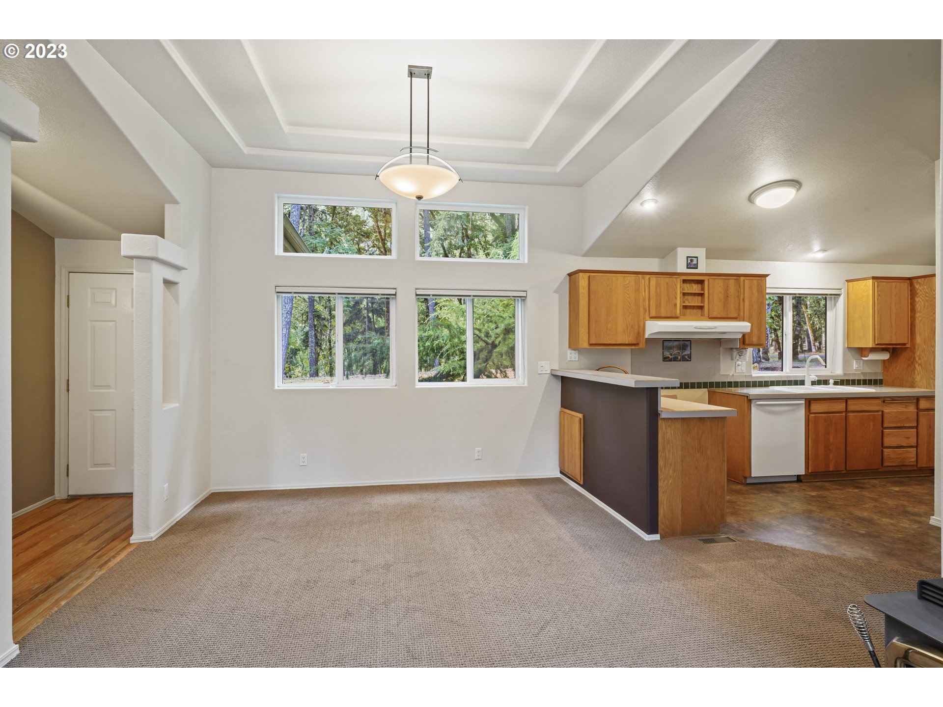 31861 Owl Road Eugene, OR 97405 - Photo 12 of 38 a kitchen with kitchen island granite countertop stainless steel appliances stove sink and cabinets
