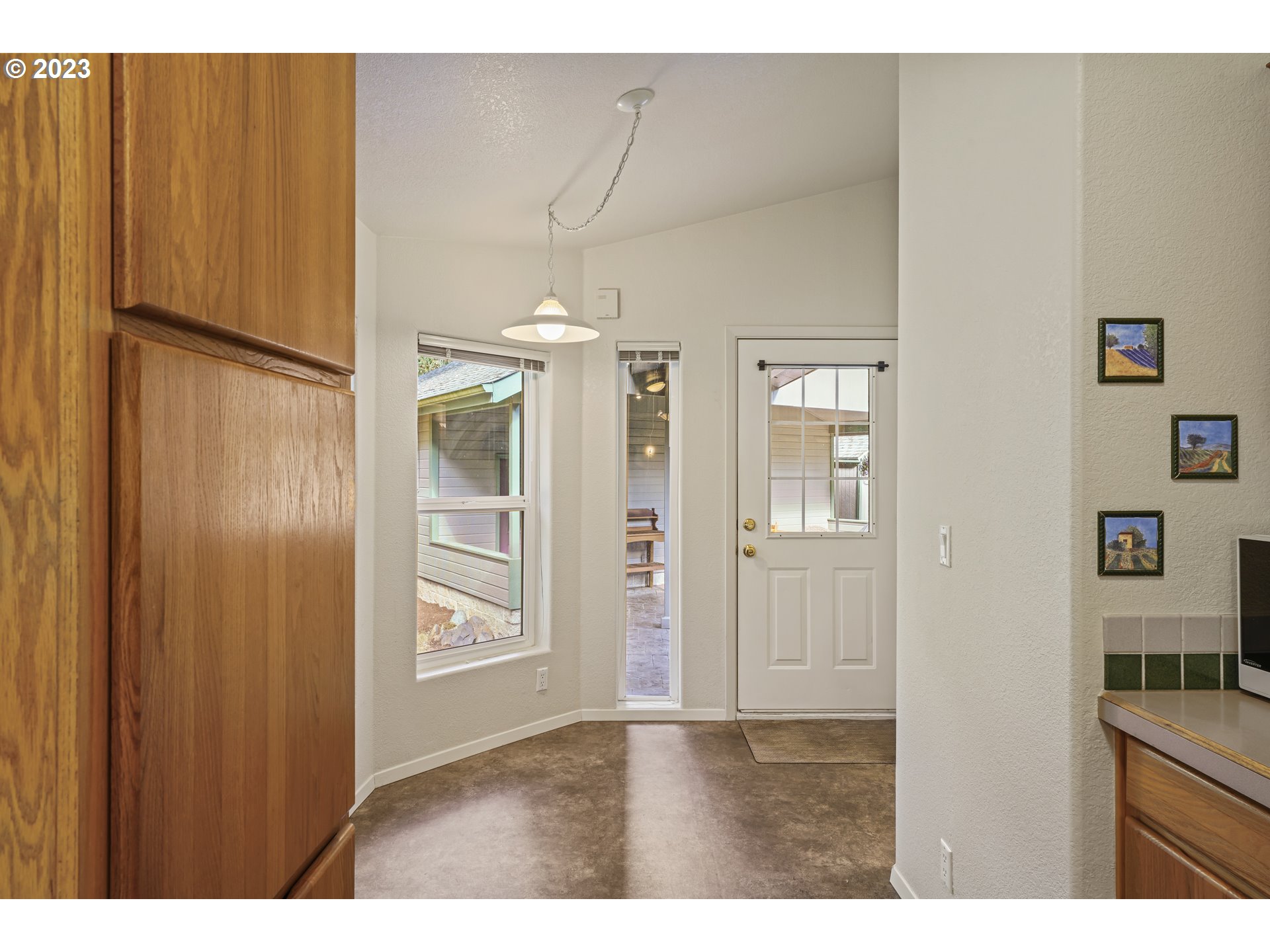 31861 Owl Road Eugene, OR 97405 - Photo 16 of 38 a view of an empty room with closet and wooden floor