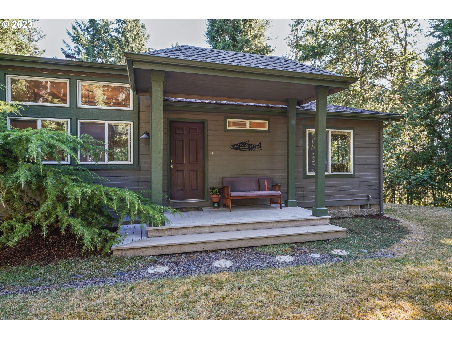 31861 Owl Road Eugene, OR 97405 - Photo 2 of 38 a front view of a house with a yard