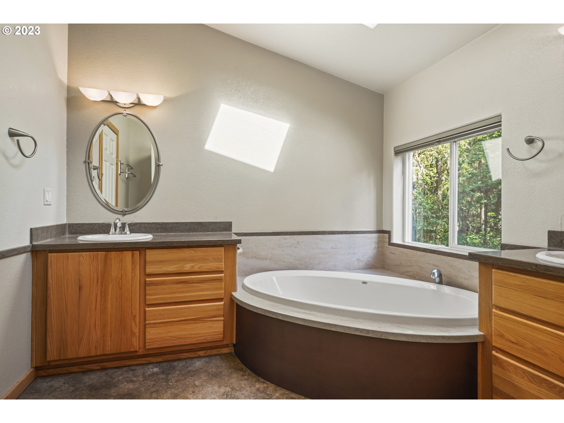 31861 Owl Road Eugene, OR 97405 - Photo 21 of 38 a bathroom with a sink and a mirror