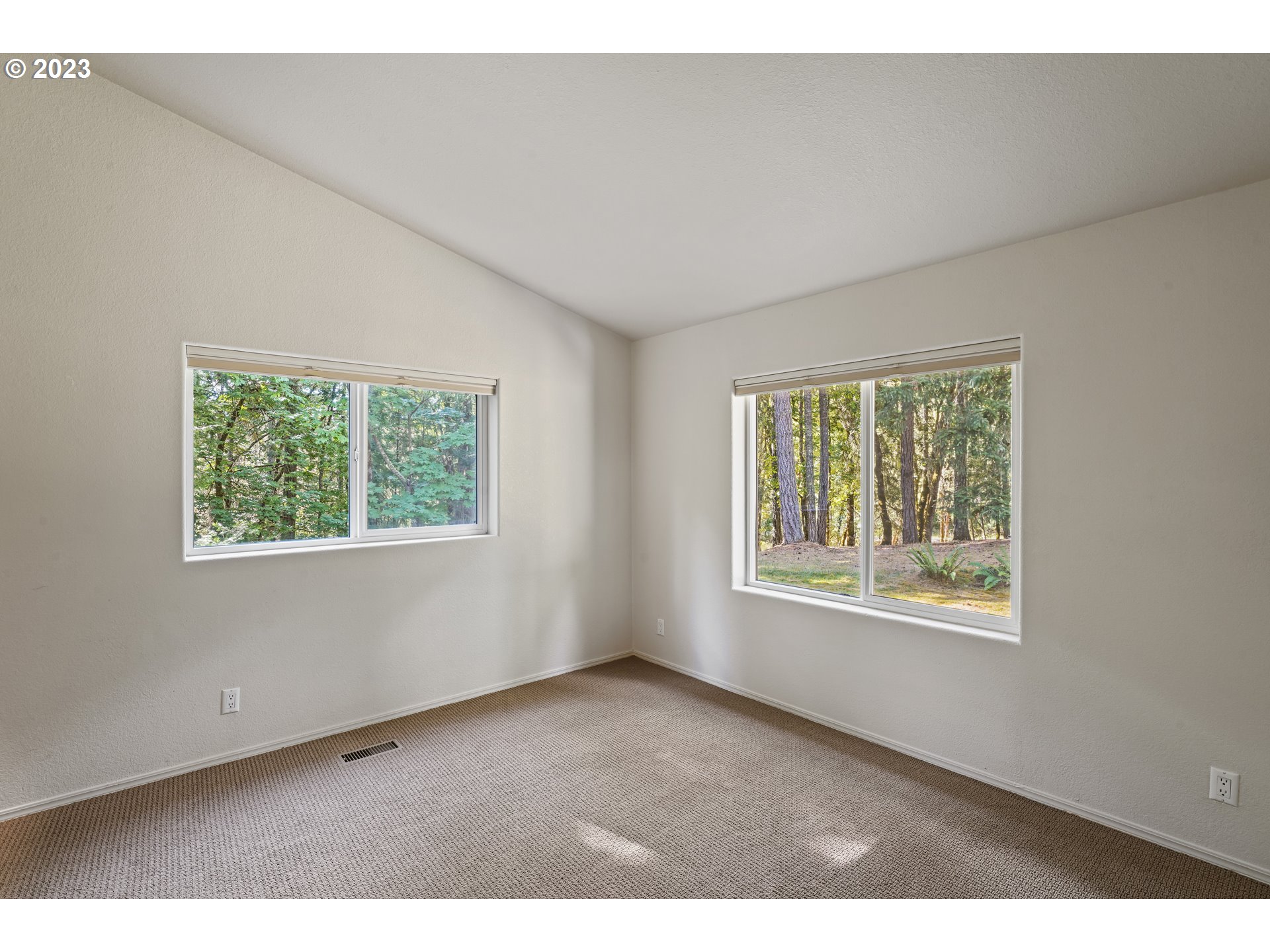 31861 Owl Road Eugene, OR 97405 - Photo 27 of 38 a view of an empty room with a window