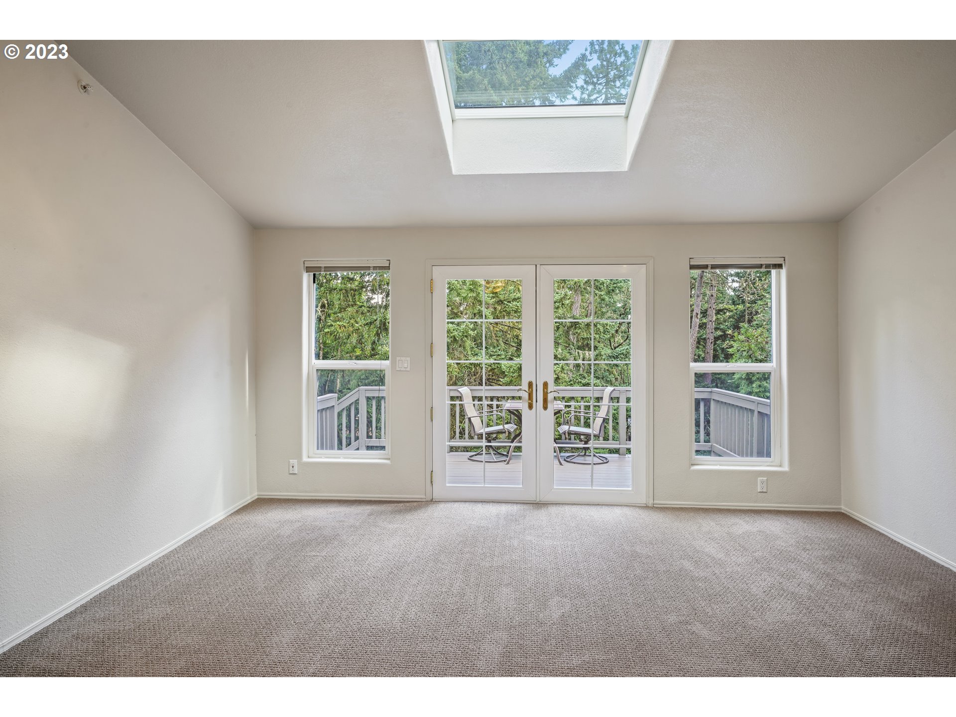 31861 Owl Road Eugene, OR 97405 - Photo 7 of 38 a view of an empty room with a window