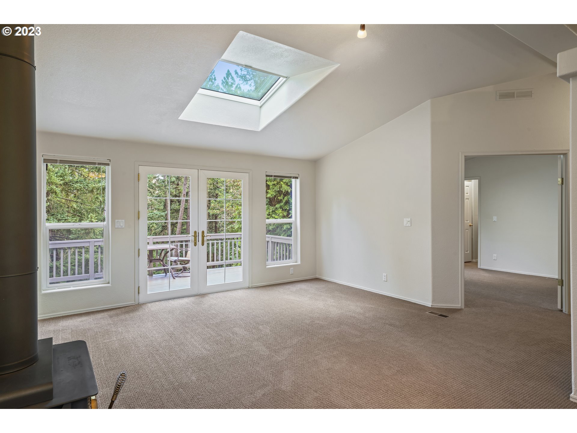 31861 Owl Road Eugene, OR 97405 - Photo 8 of 38 a view of an empty room with a window