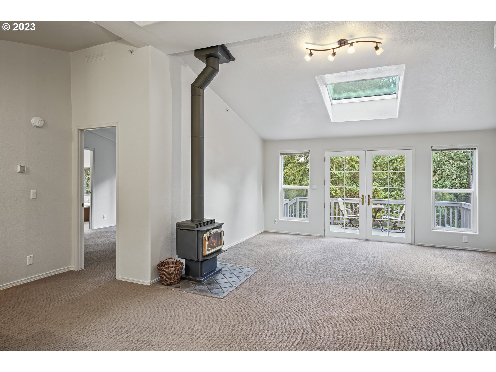 31861 Owl Road Eugene, OR 97405 - Photo 9 of 38 a living room with furniture and large windows