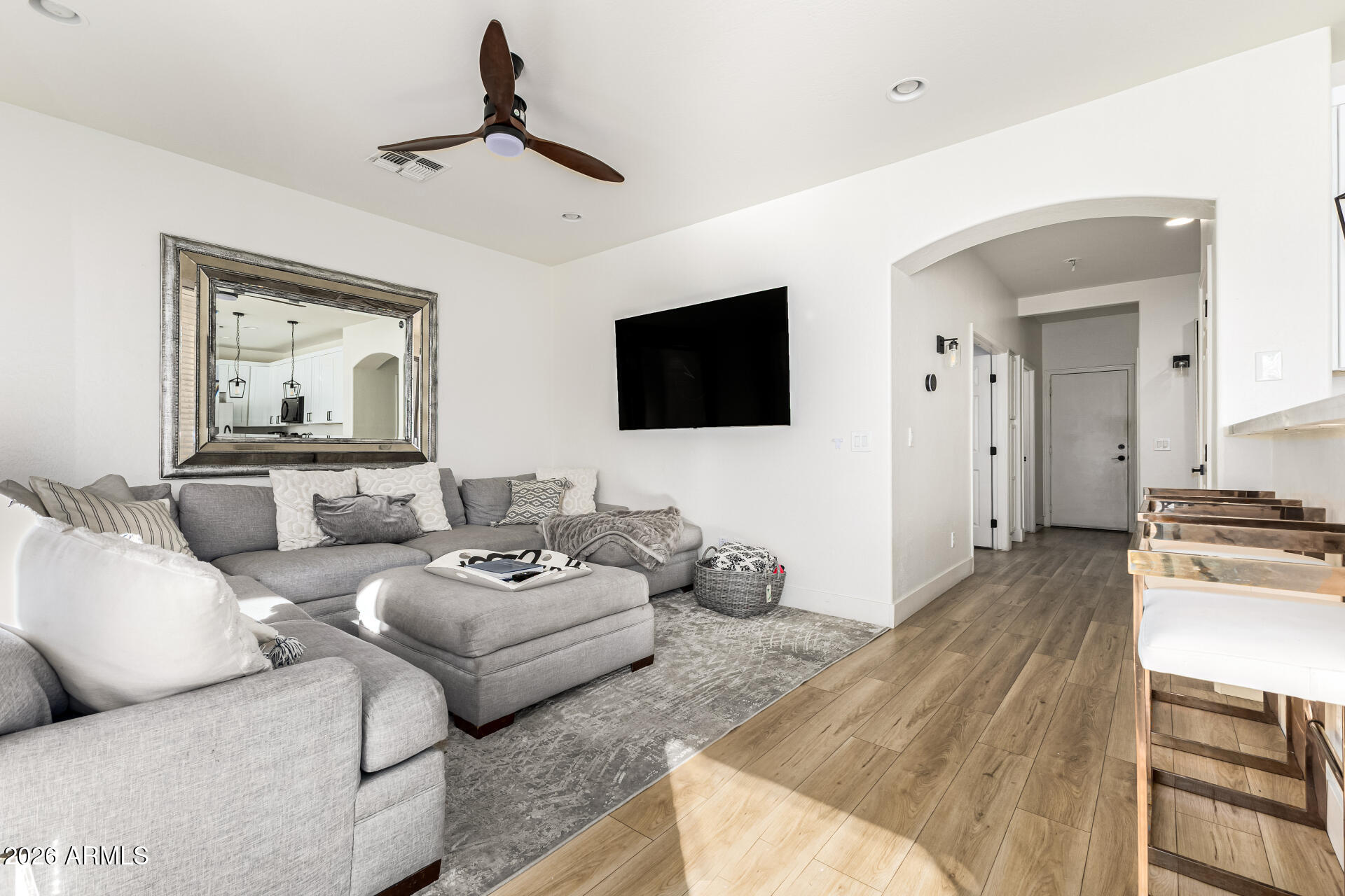 2707 West Lamar Road Phoenix, AZ 85017 - Photo 12 of 50 a living room with furniture and a flat screen tv