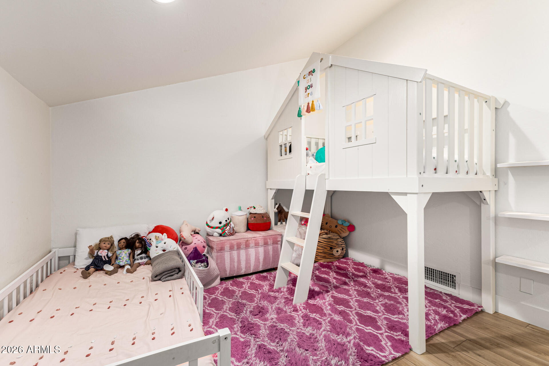 2707 West Lamar Road Phoenix, AZ 85017 - Photo 20 of 50 a living room with furniture and a baby crib