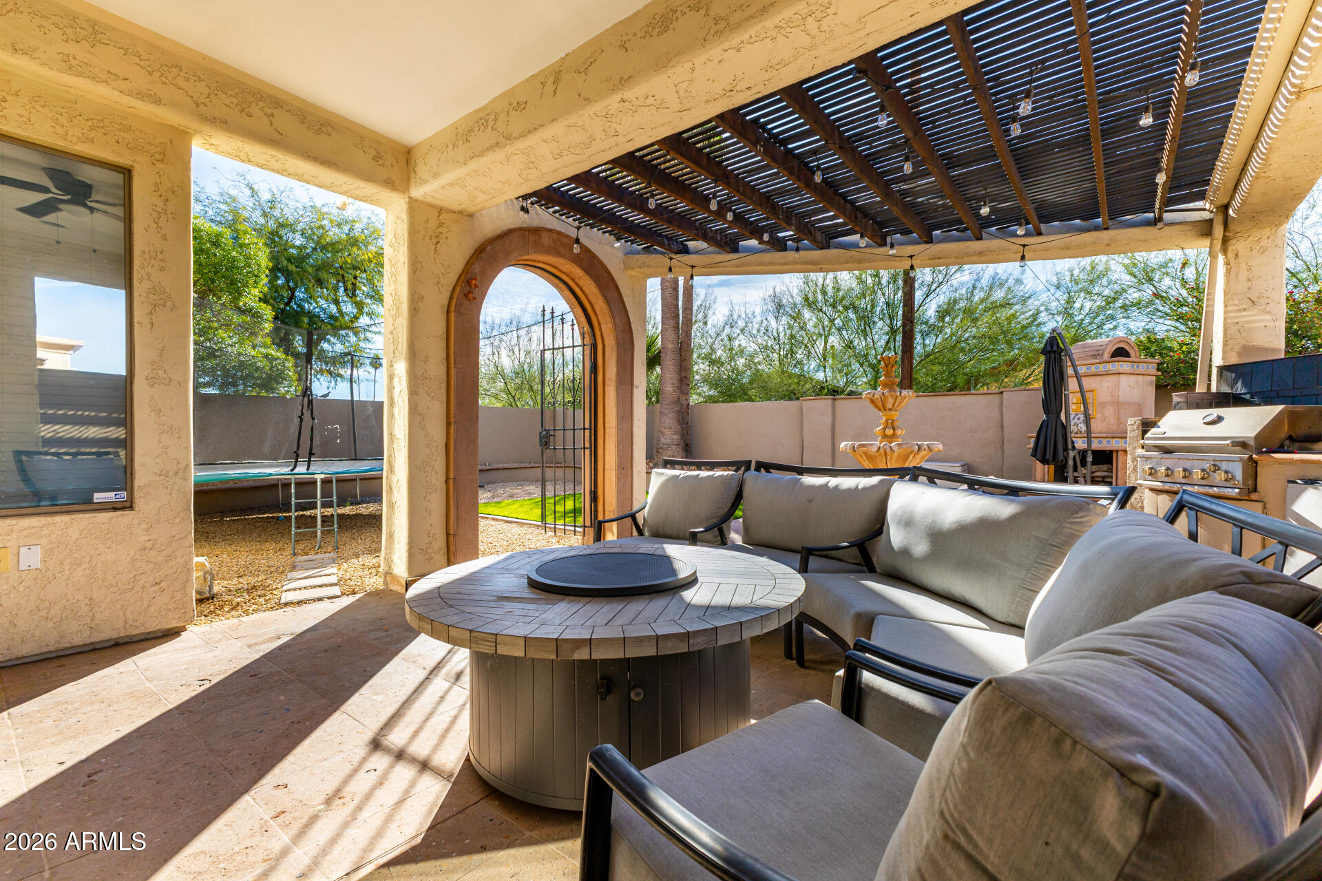 2707 West Lamar Road Phoenix, AZ 85017 - Photo 36 of 50 a outdoor space with patio the couches and a dining table with garden view