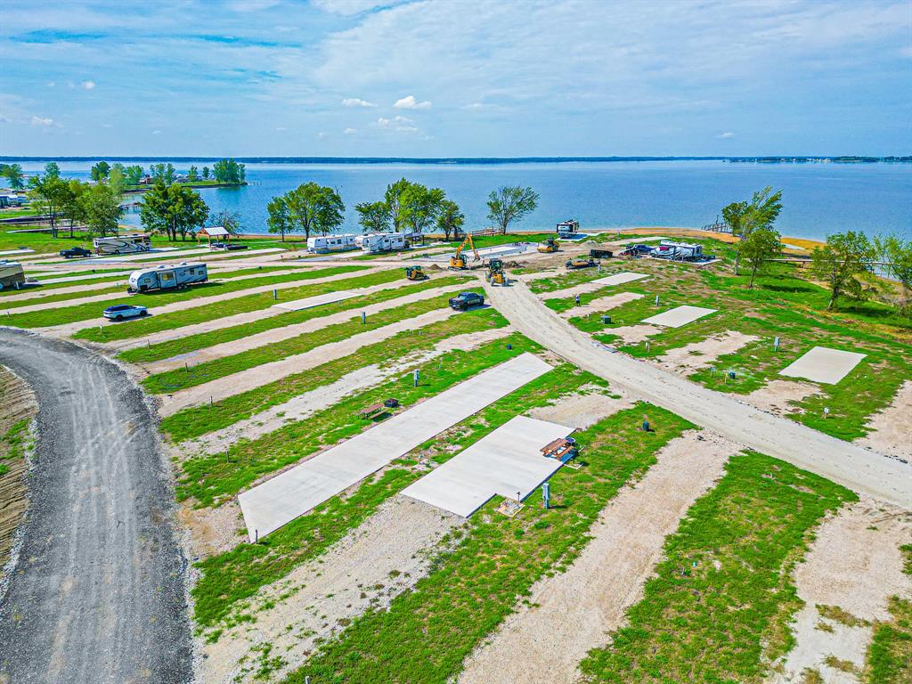Lot 186 Peninsula Point Kerens, TX 75144 - Photo 16 of 28 a view of a swimming pool with an outdoor space