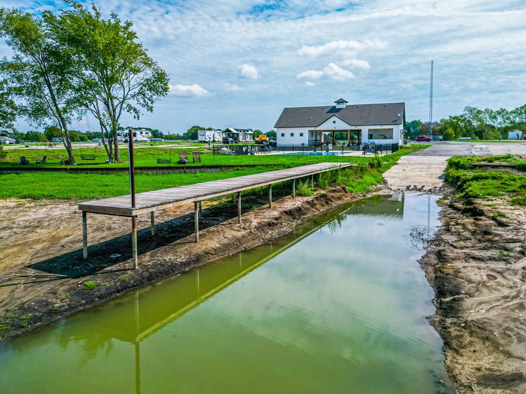 Lot 186 Peninsula Point Kerens, TX 75144 - Photo 17 of 28 a view of a swimming pool with a garden