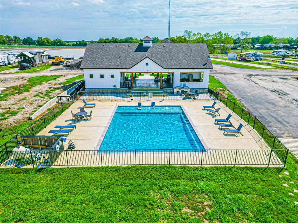 Lot 186 Peninsula Point Kerens, TX 75144 - Photo 2 of 28 a view of house with garden space and sitting area