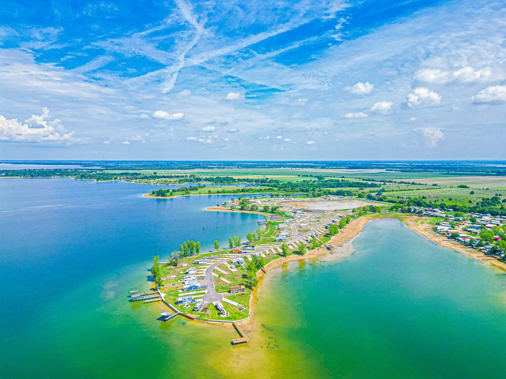 Lot 186 Peninsula Point Kerens, TX 75144 - Photo 28 of 28 a view of a lake with a big yard