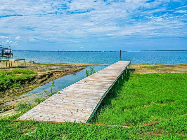 a view of a swimming pool with an ocean view