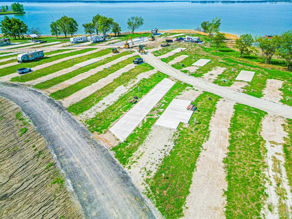Lot 186 Peninsula Point Kerens, TX 75144 - Photo 7 of 28 a view of a yard with an umbrella