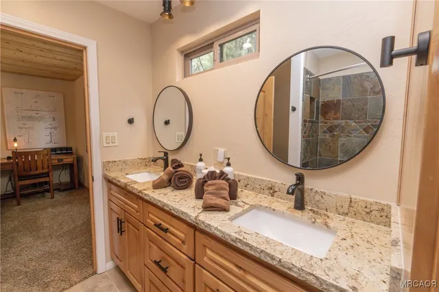 a bedroom with a bed and dresser