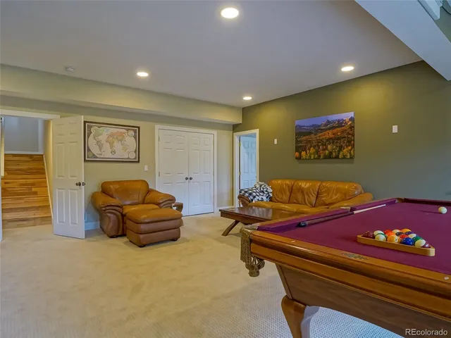 a bedroom with bed and couch