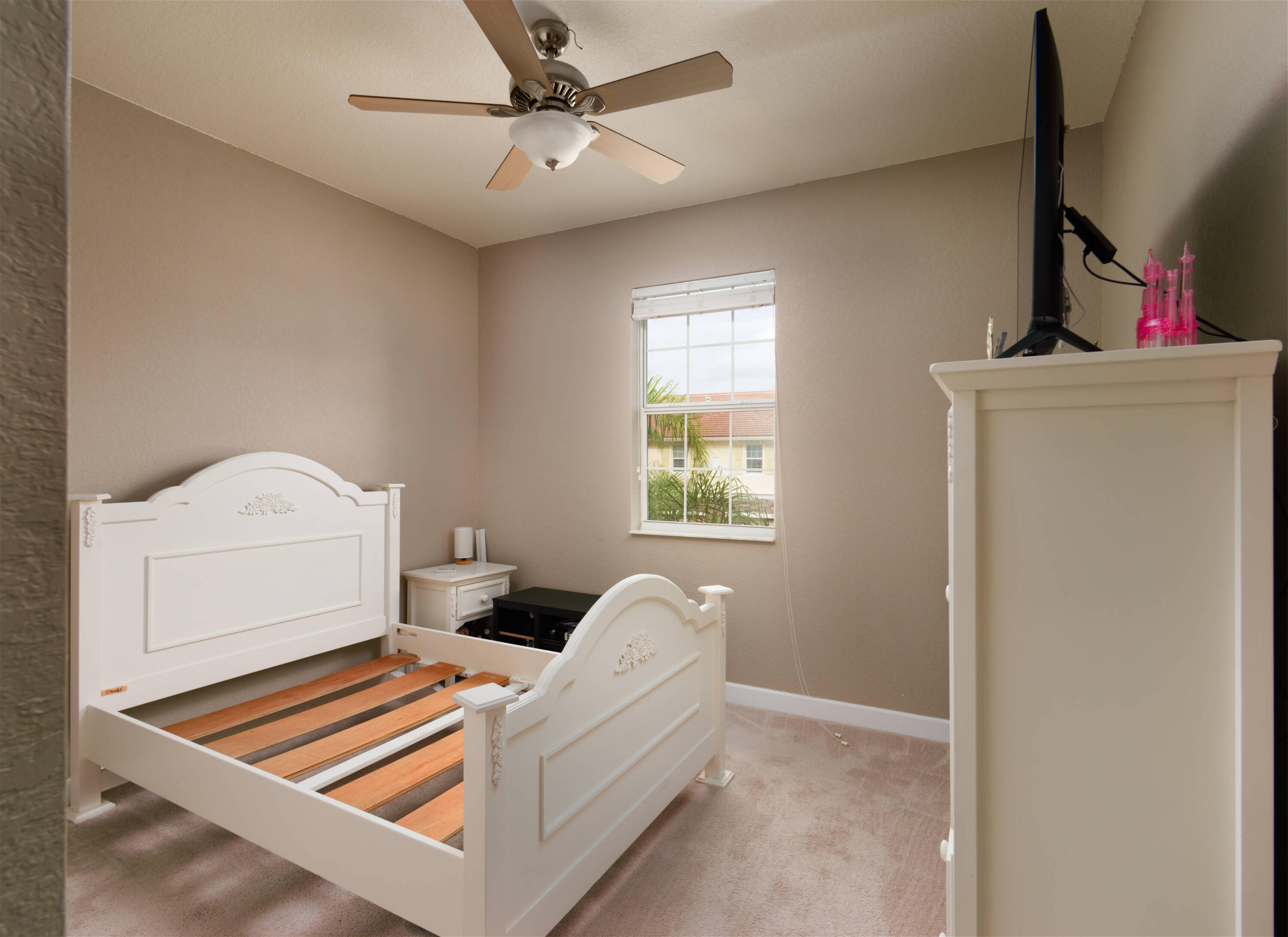 9674 Southwest Purple Martin Way Stuart, FL 34997 - Photo 12 of 21 a living room with furniture and a window