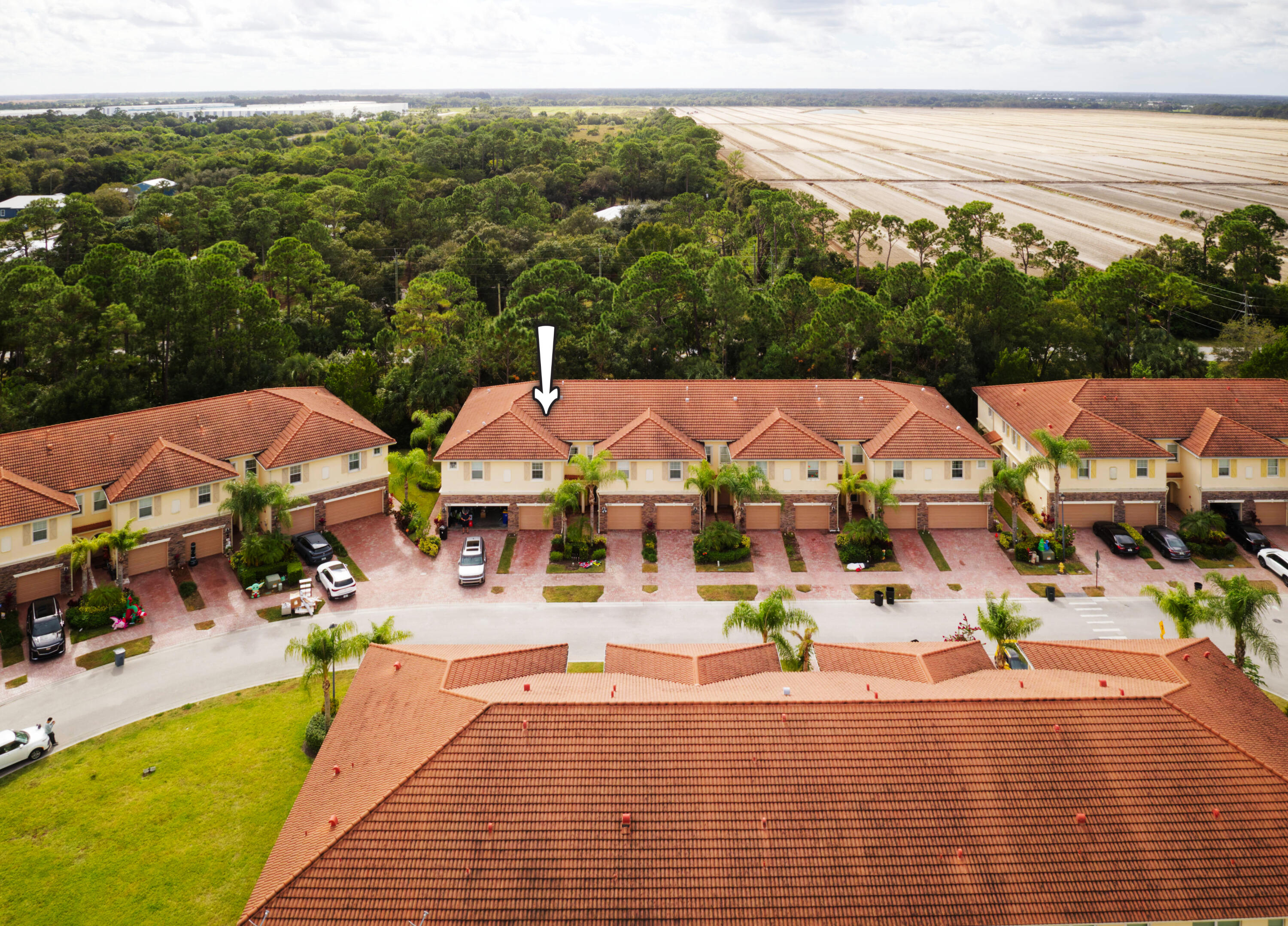 9674 Southwest Purple Martin Way Stuart, FL 34997 - Photo 15 of 21 a view of a city with lawn chairs
