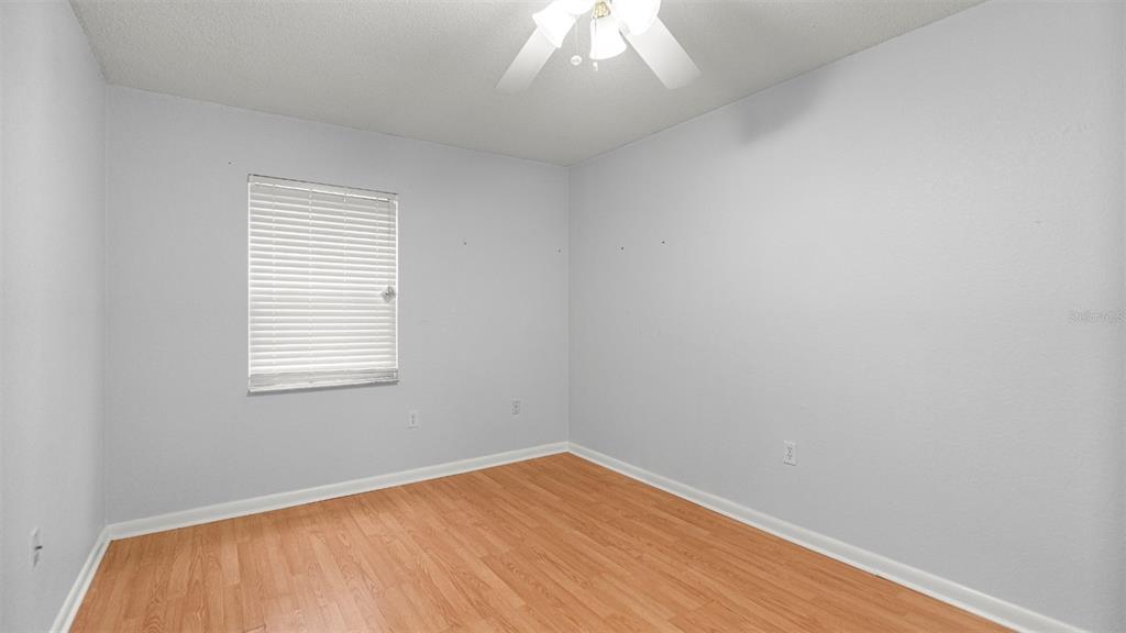 501 Southwest 75th Street, Unit B5 Gainesville, FL 32607 - Photo 21 of 38 an empty room with a window
