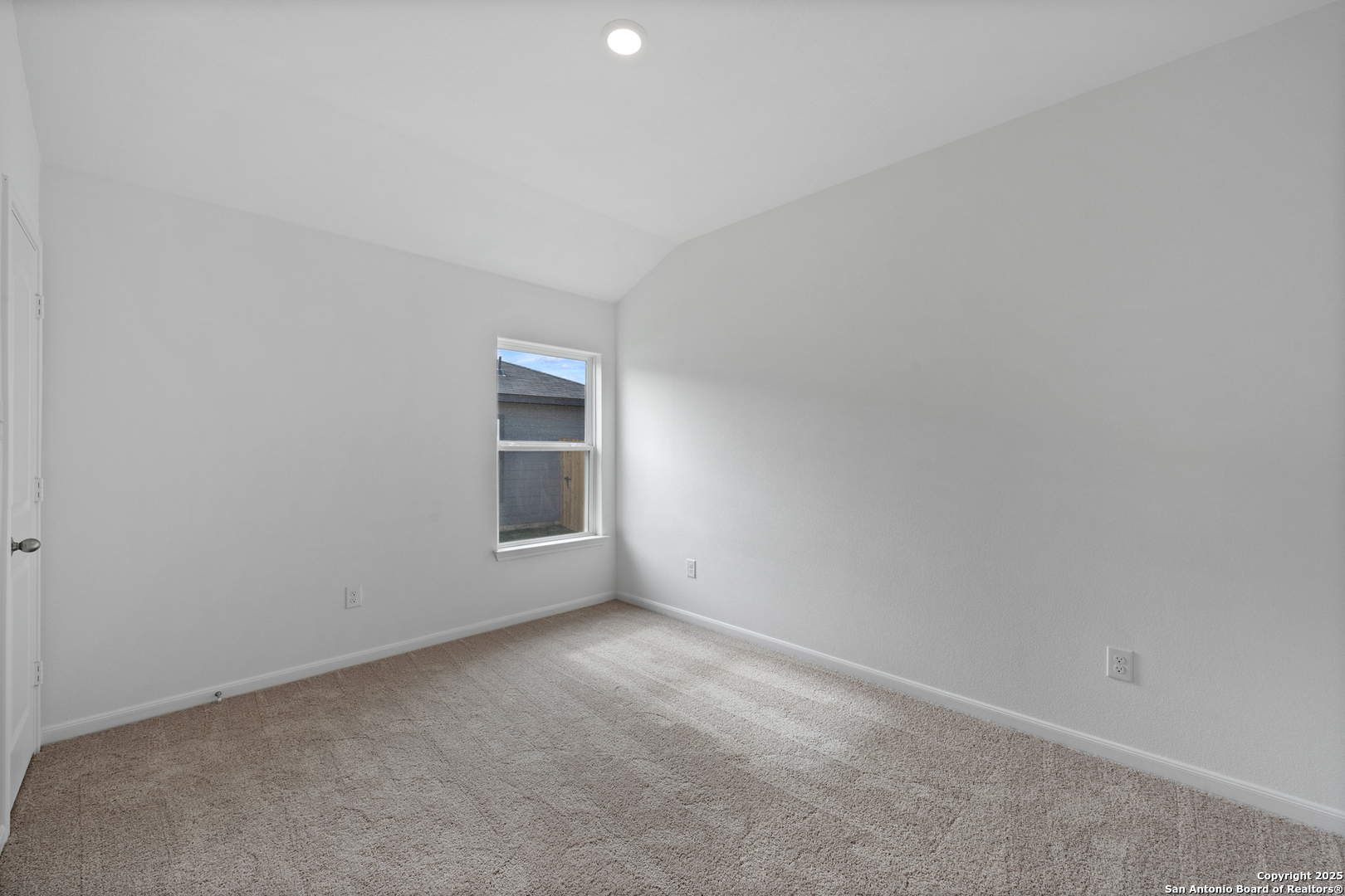 16024 Stratford Cove Lytle, TX 78052 - Photo 13 of 27 a view of an empty room with a window