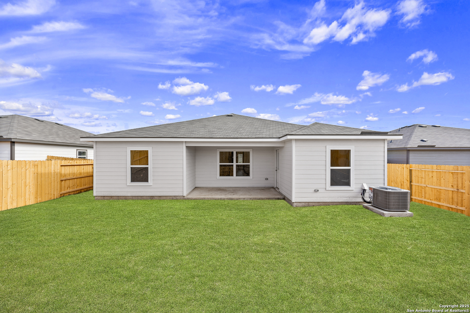 16024 Stratford Cove Lytle, TX 78052 - Photo 2 of 27 a front view of house with yard and trees in the background