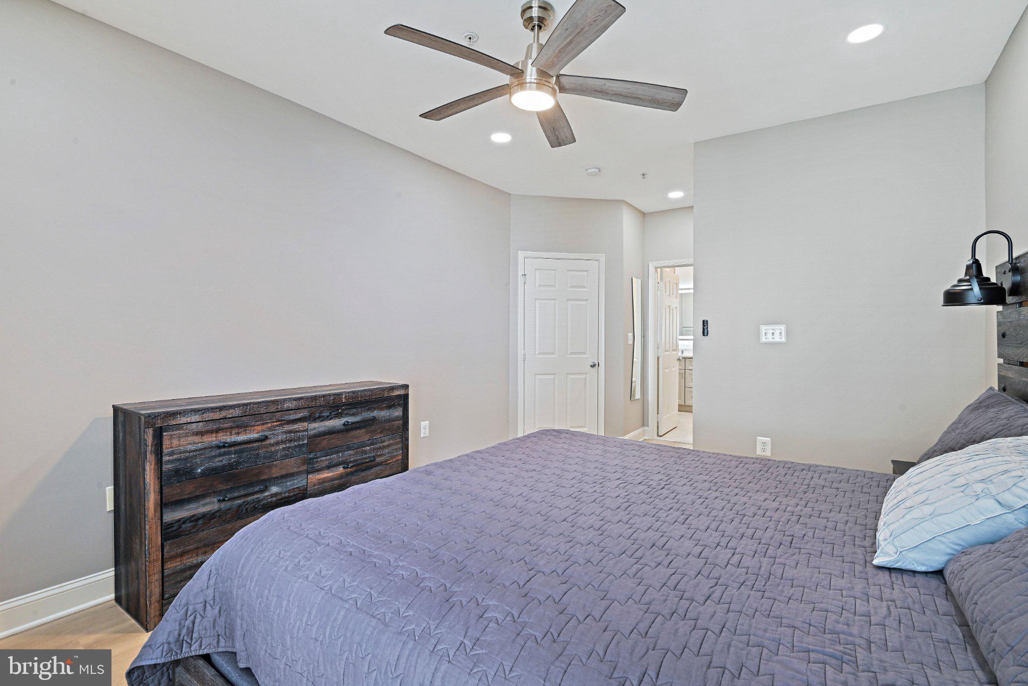 1519 North Point Drive, Unit 202 Reston, VA 20194 - Photo 31 of 49 Modern bedroom with sleek design.