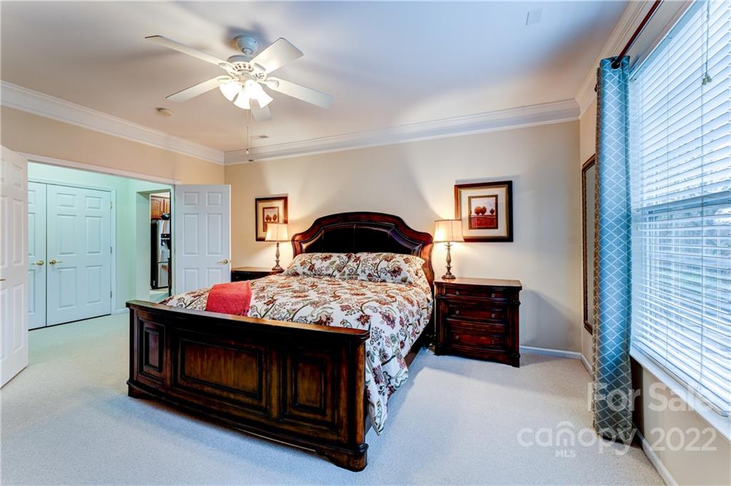 2336 Jade Lane Fort Mill, SC 29708 - Photo 19 of 41 a bedroom with a bed and a ceiling fan