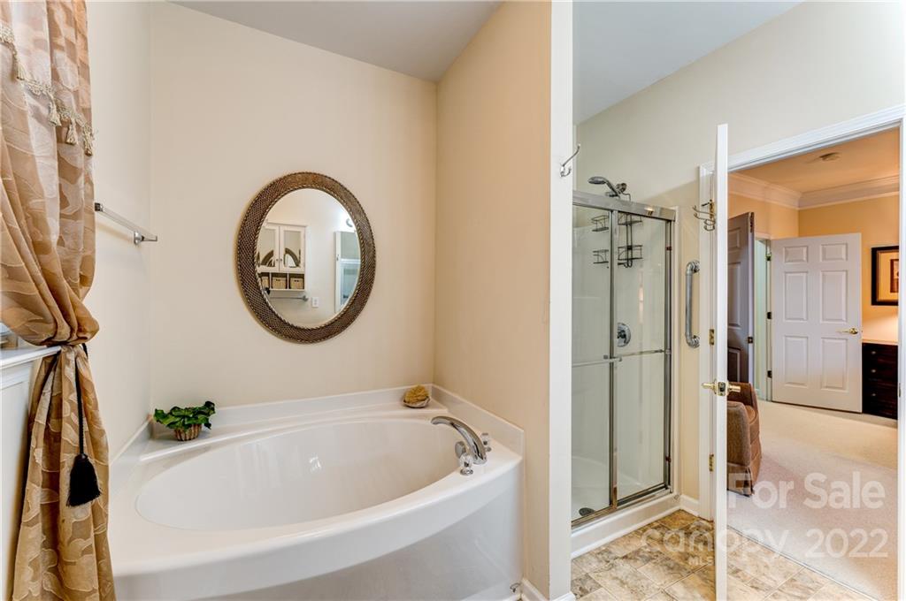 2336 Jade Lane Fort Mill, SC 29708 - Photo 23 of 41 a bathroom with a tub and shower