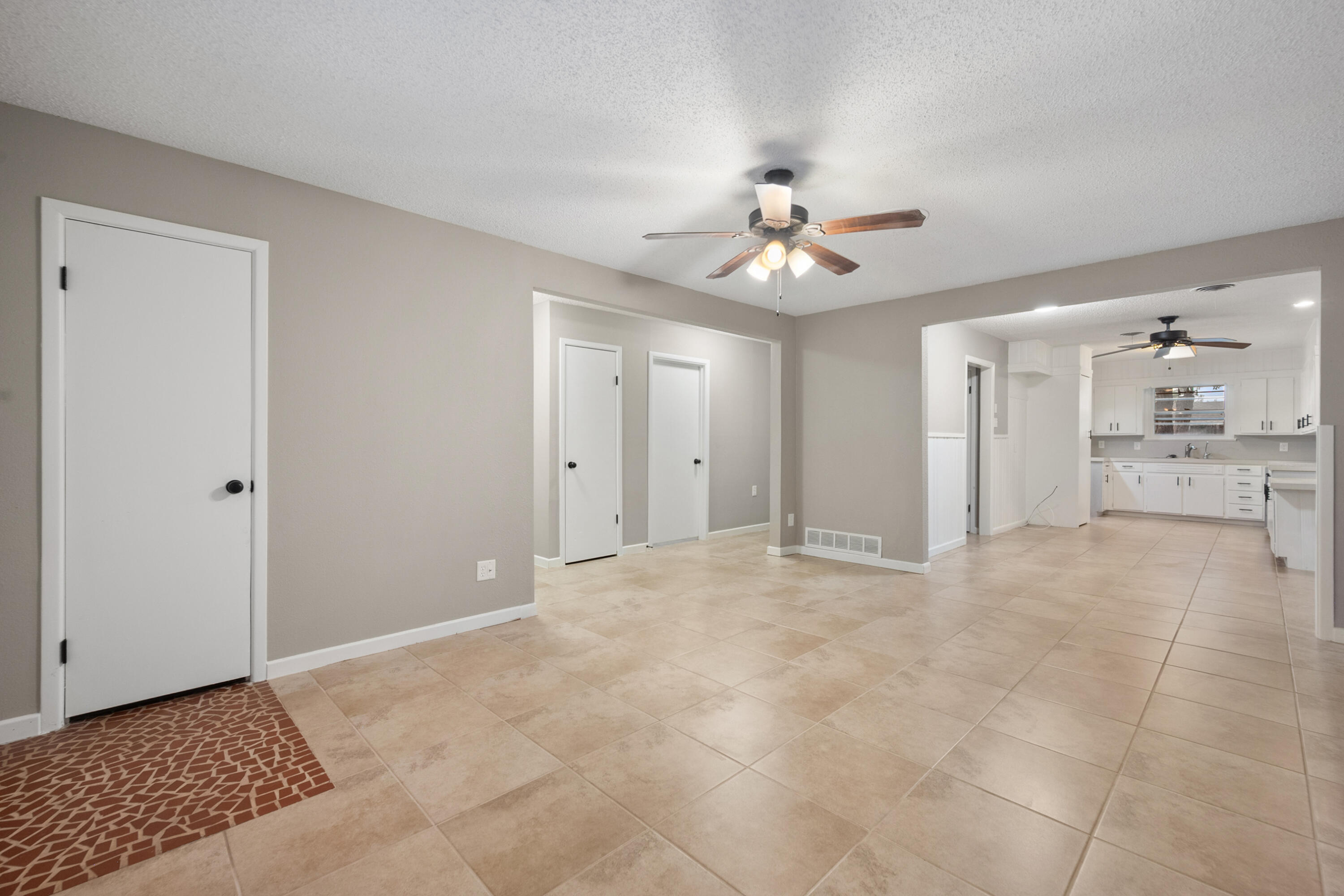 4915 11th Street Lubbock, TX 79416 - Photo 6 of 28 a view of an empty room with a window