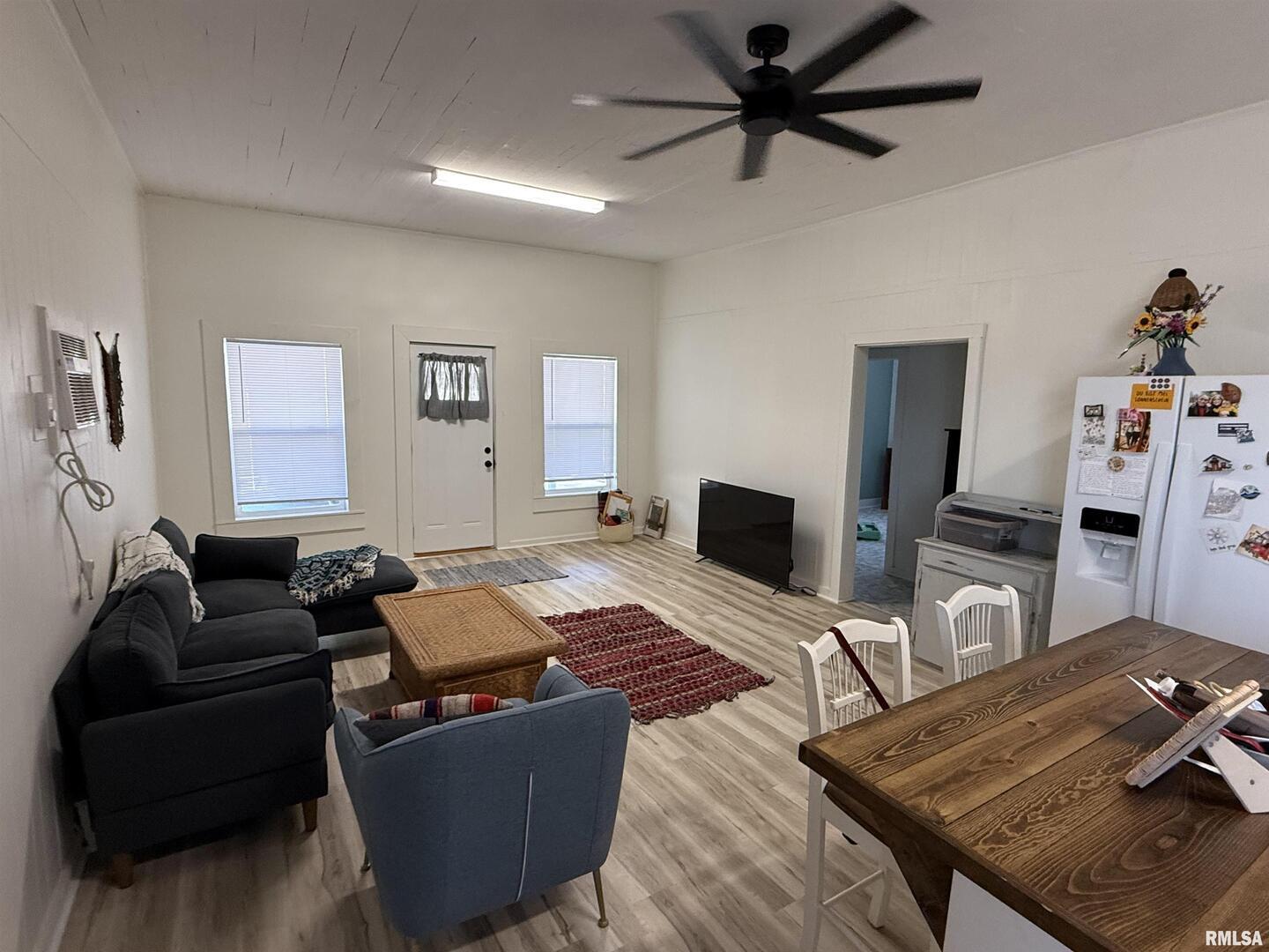 1100 Catherine Street Metropolis, IL 62960 - Photo 13 of 64 a living room with furniture and wooden floor