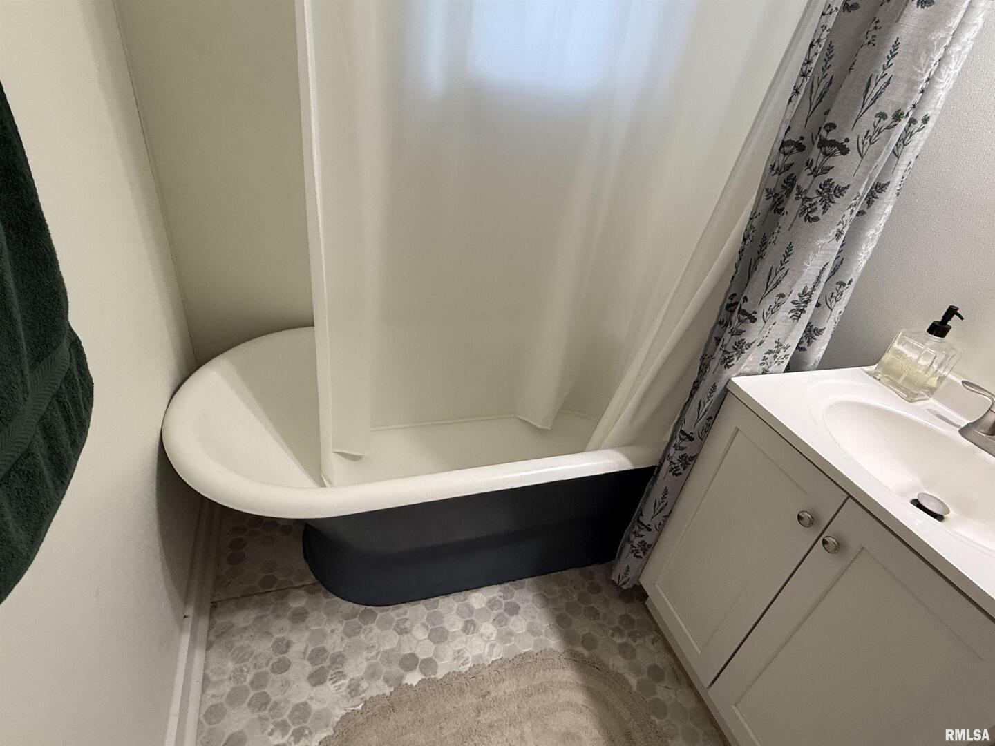 1100 Catherine Street Metropolis, IL 62960 - Photo 37 of 64 a bathroom with a sink and mirror