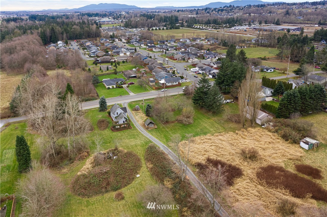 1810 Trigg Road Ferndale, WA 98248 - Photo 11 of 16 an aerial view of residential houses with outdoor space and trees