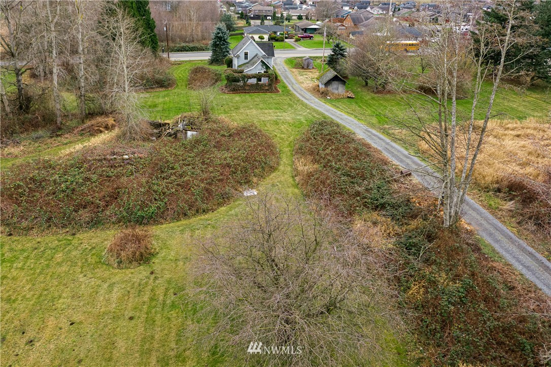1810 Trigg Road Ferndale, WA 98248 - Photo 13 of 16 a view of a yard with a house