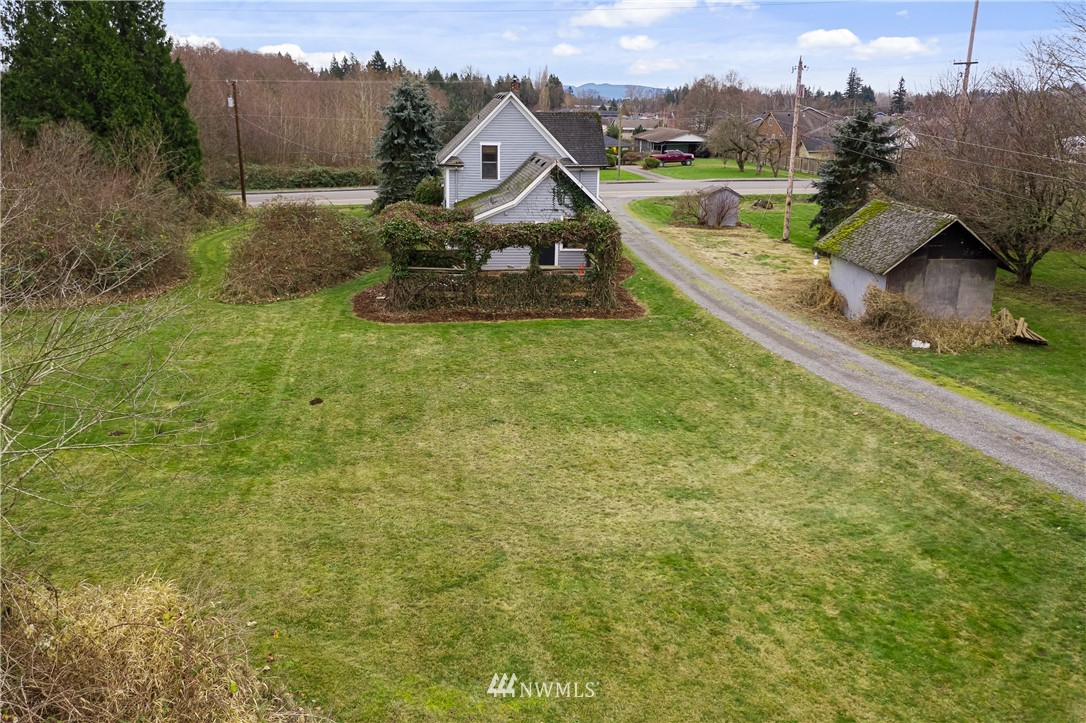 1810 Trigg Road Ferndale, WA 98248 - Photo 14 of 16 a view of a house with a yard
