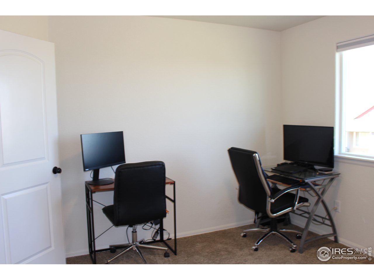 2137 Day Spring Drive Windsor, CO 80550 - Photo 18 of 39 a view of workspace with wooden floor chair and piano